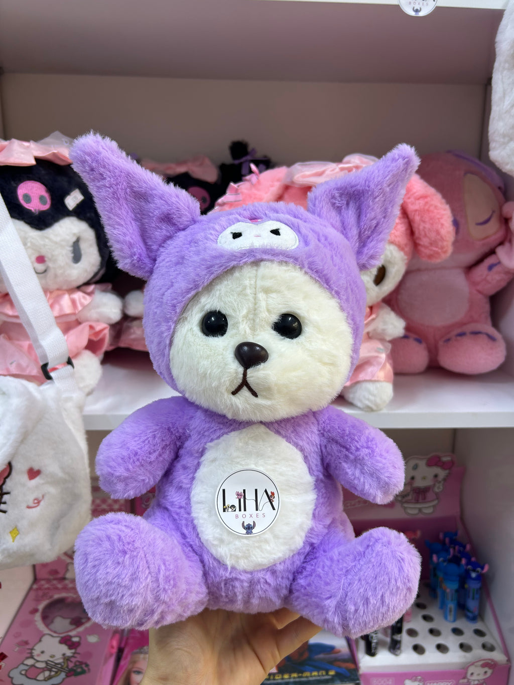 Peluche capuche