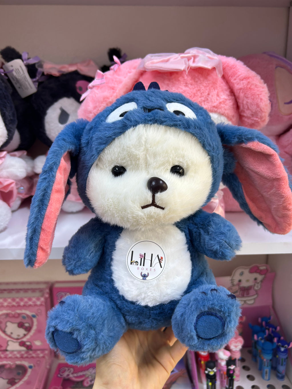 Peluche capuche